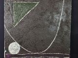une photo d'une œuvre d'art posée sur une table