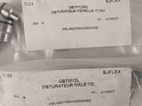 two pieces of metal screws in plastic bags on a white surface