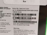 a label on the back of a cell phone