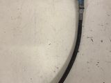 a close up of a hose attached to a wall with a hose attached to it