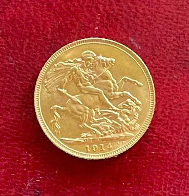 une pièce d'or sur laquelle est représenté un homme à cheval