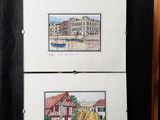 two paintings of a house and a boat on a easel