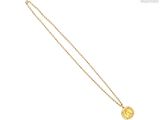 un collier en or avec une pièce de monnaie sur une chaîne