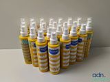 several bottles of sunscreen lotion sitting on a table