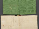 two pieces of cloth with a small patch on top of it