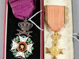 a small box with a medal and a medal on it
