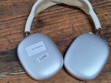 a pair of headphones sitting on a wooden table