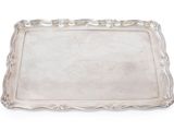 a silver tray on a white background with a silver handle