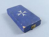 a small blue box with a white star on it