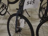 three bikes that are on display in a room