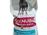 une image représentant un sac de croquettes pour chien sur lequel figure un chien