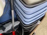 a box full of cleaning supplies sitting on the floor