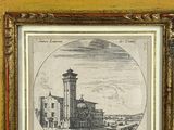 an old picture of a building with a clock tower in the middle of it