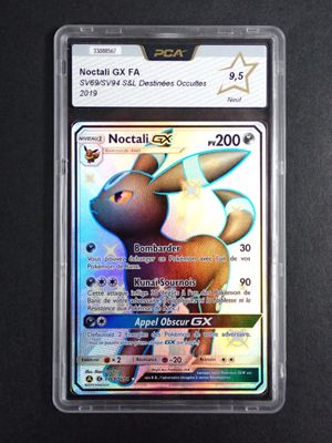 a close up of a pokemon card on a black surface