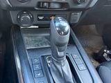 an image of a car dashboard with a gear stick