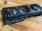 an image of a close up of a video card on a wooden table