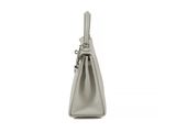the small grey bag is on a white background