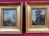 deux tableaux encadrés représentant une scène boisée avec des personnages dans un décor boisé