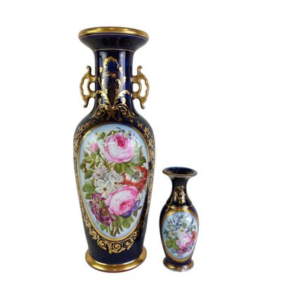 two vases sitting next to each other on a white surface