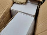 many boxes that are sitting on the floor next to each other