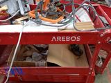 an image of a red work bench with tools in it