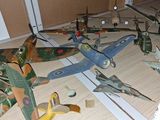 a lot of toy airplanes that are on the floor