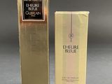 the box of the perfume is next to the box of the perfume