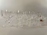 a lot of empty wine glasses sitting on a table