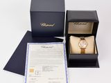 a close up of a box with a watch inside of it