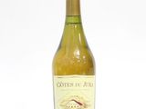 a bottle of wine that is sitting on a table