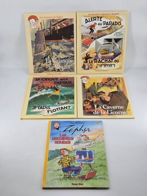 quatre livres pour enfants sont alignés sur une surface blanche