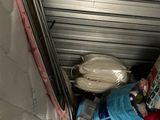 a pile of stuff in the back of a truck