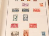 a book with a lot of different stamps on it