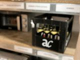 a lot of shelves that have beer bottles on them