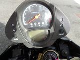 a close up of a speedometer on a motorcycle