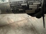 a close up of a motor bike with a sticker on it