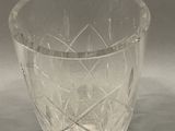 a clear glass cup with a pattern on it