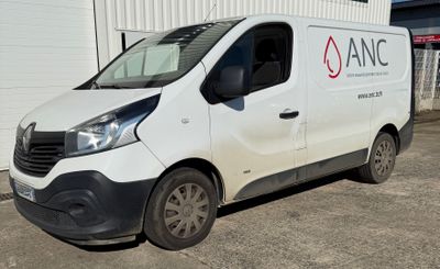 a van that is parked in front of a building