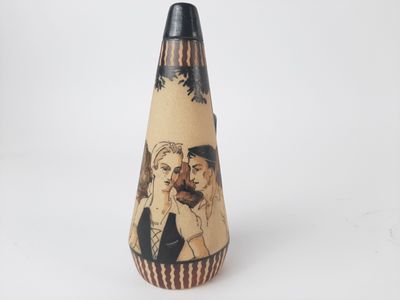 a pencil with a picture of a man and a woman on it