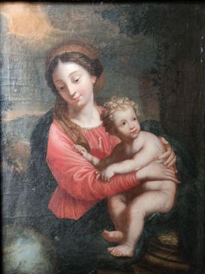 une image d'un tableau représentant une femme tenant un enfant dans ses bras