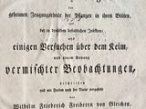 an old book with a black and white title on it