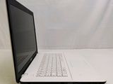 a laptop that is sitting on a white table