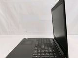 the back of a laptop computer sitting on top of a white table
