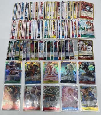 a large collection of pokemon cards on a table