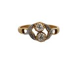 an image of a gold and diamond ring on a white background