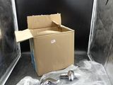 a box with a box of silver items inside of it
