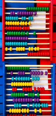 an image of a colorful abacuse with many colored balls