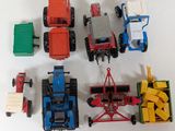 a lot of toy vehicles that are sitting on a table