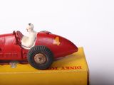 a toy car that is sitting on top of a box