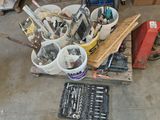 a lot of tools that are sitting on a pallet
